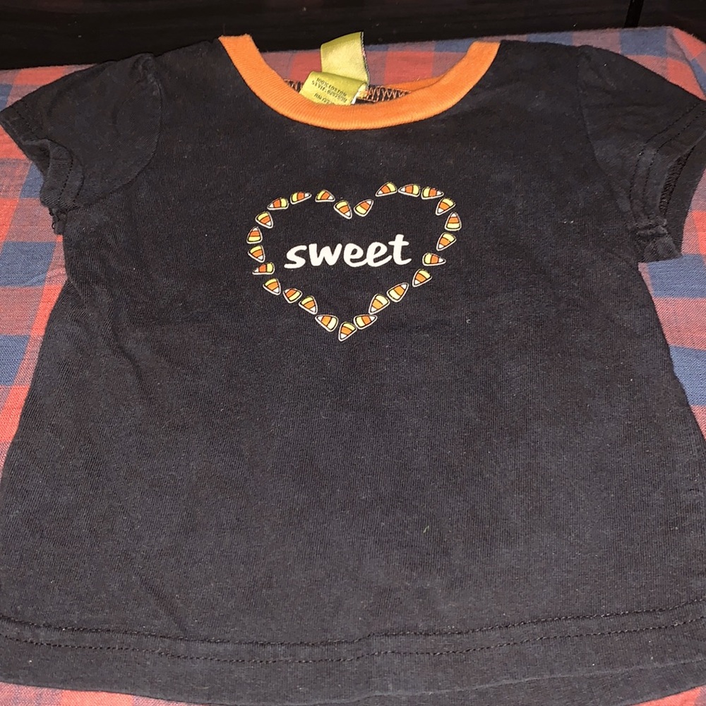 Black&Orange Halloween themed T-shirt with candy corn design